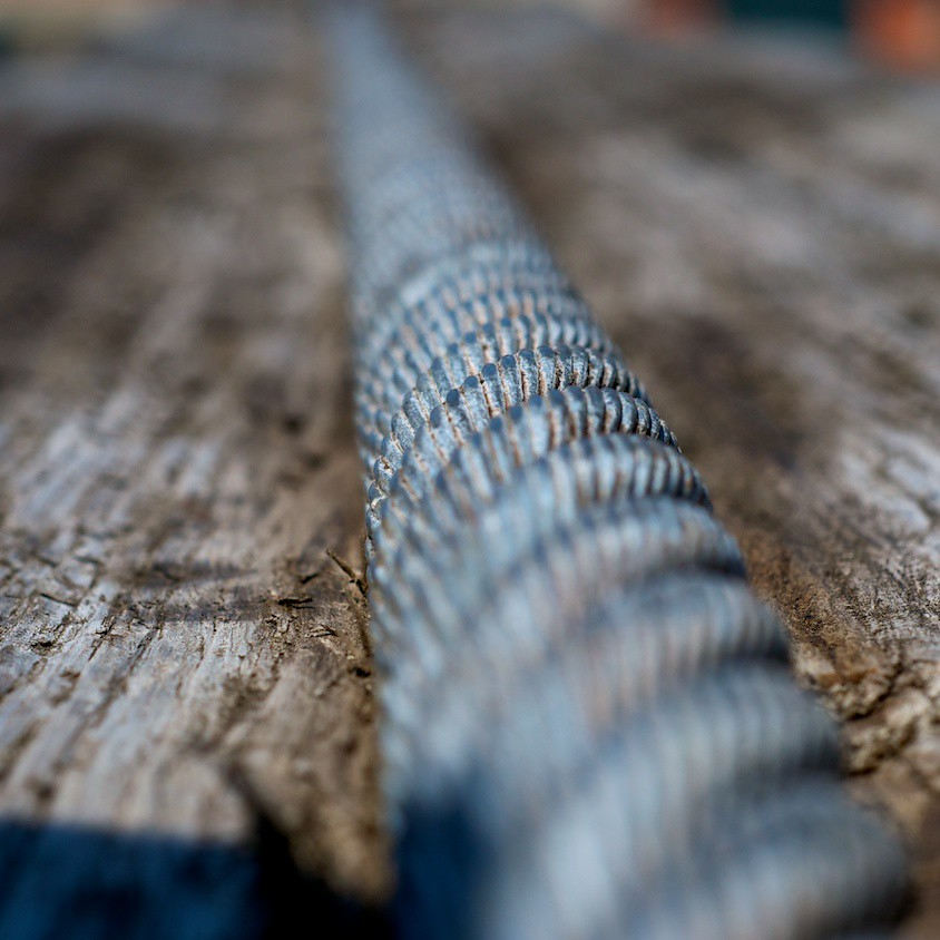 Picture of a cable against wood background